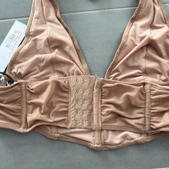 Halter runched crop top. NEVER WORN.Tag still on. Adjustable back and top sizing - Picture 2 of 4
